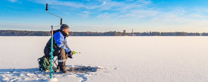 Man enjoying the scenery of the icy landscape